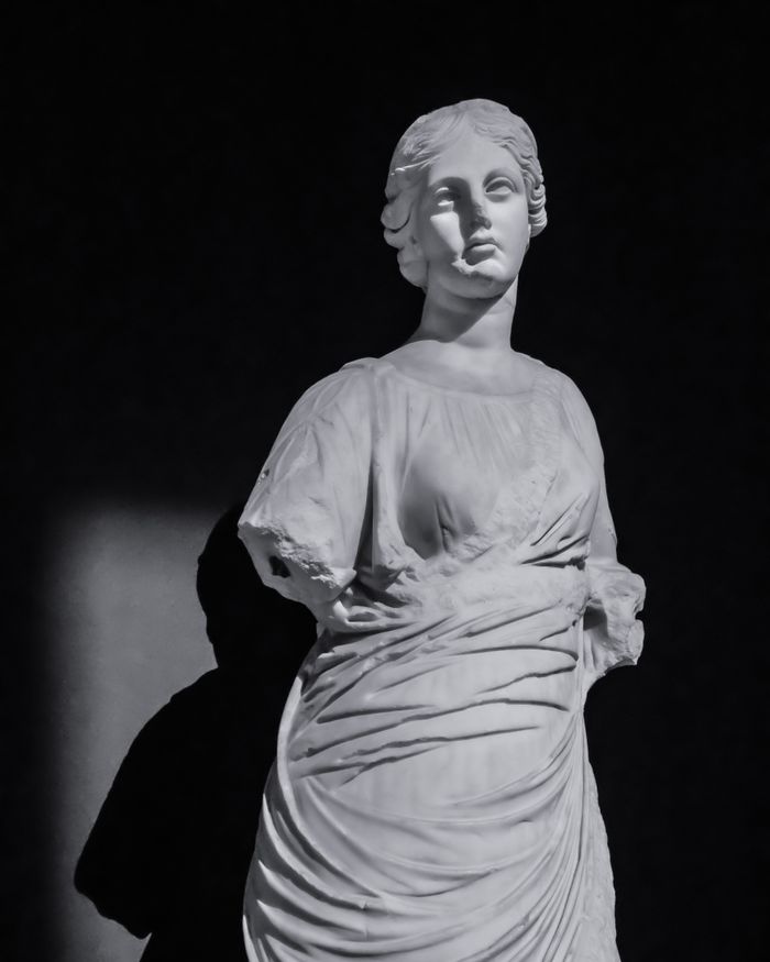 Classic marble statue in black and white, showcasing ancient artistry in Istanbul.